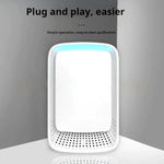 White air purifier with blue light on a gray background